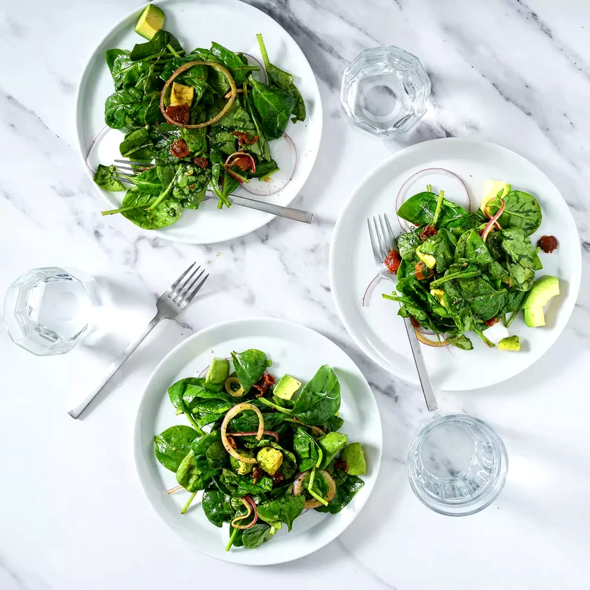 Spinach Salad with Warm Bacon Vinaigrette, Red Onion & Avocado