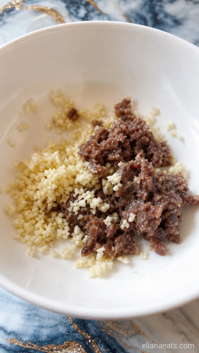 Step 1: Mince the Garlic and Anchovy Paste
